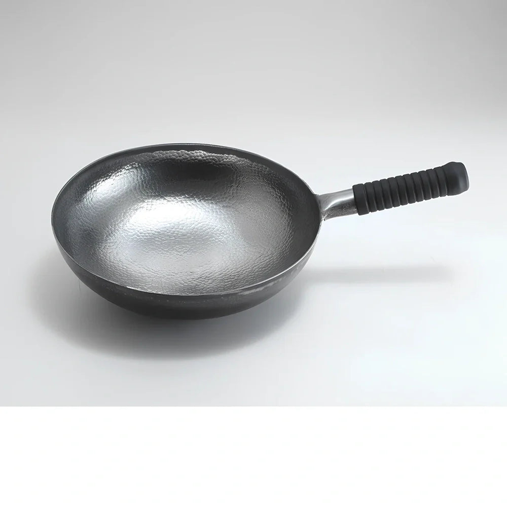 One-piece iron cooking pan with uncoated surface in hot forged silver white or roasted blue finish