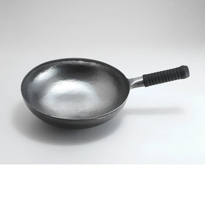 One-piece iron cooking pan with uncoated surface in hot forged silver white or roasted blue finish