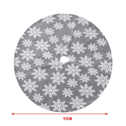 Elegant Christmas tree skirt with plush snowflake design, creating a cozy and festive holiday atmosphere.