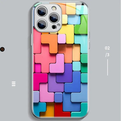 Colourful geometric building block pattern silicone back cover for iPhone, shown in glossy finish.