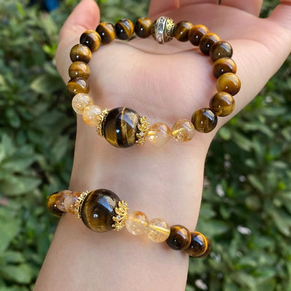 Handmade crystal bracelet with diamond gourd, disc, and prayer wheel beads in 8mm and 10mm sizes.
