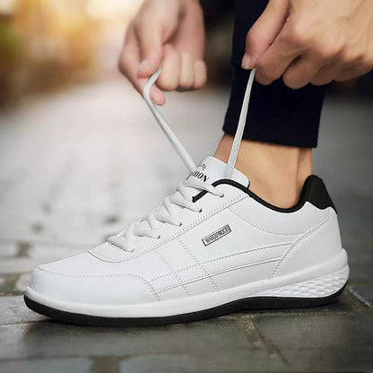 Round toe non-slip sports sneakers in black, blue, and white with breathable mesh design