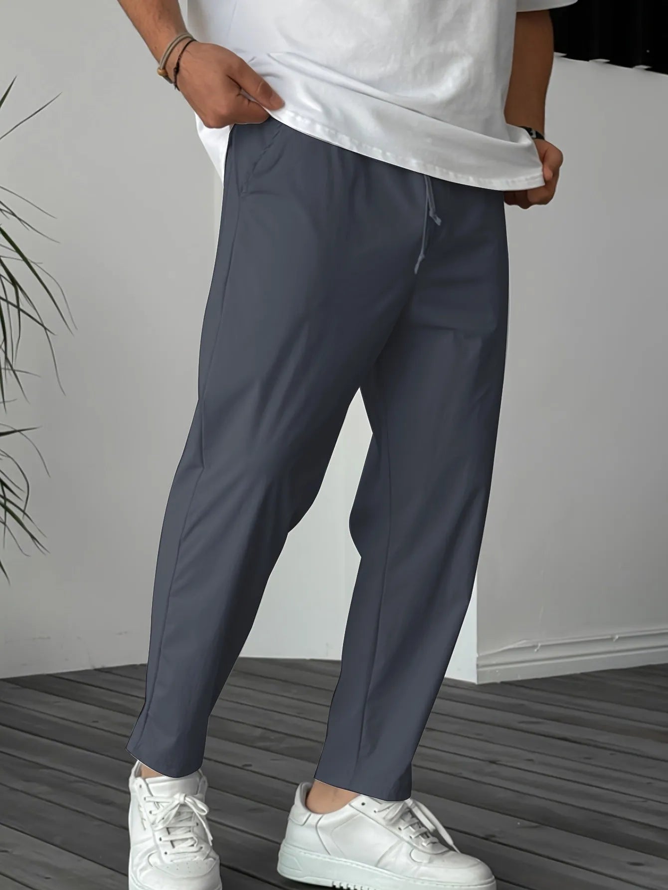 Men's khaki casual drawstring trousers with straight leg and ribbon detail on pockets