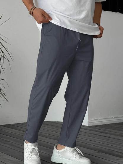 Men's khaki casual drawstring trousers with straight leg and ribbon detail on pockets