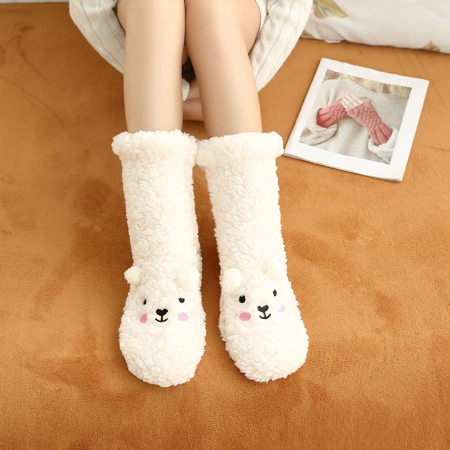 Cozy coral fleece socks with unique Japanese-inspired cartoon designs, providing warm and comfortable indoor lounging and sleeping