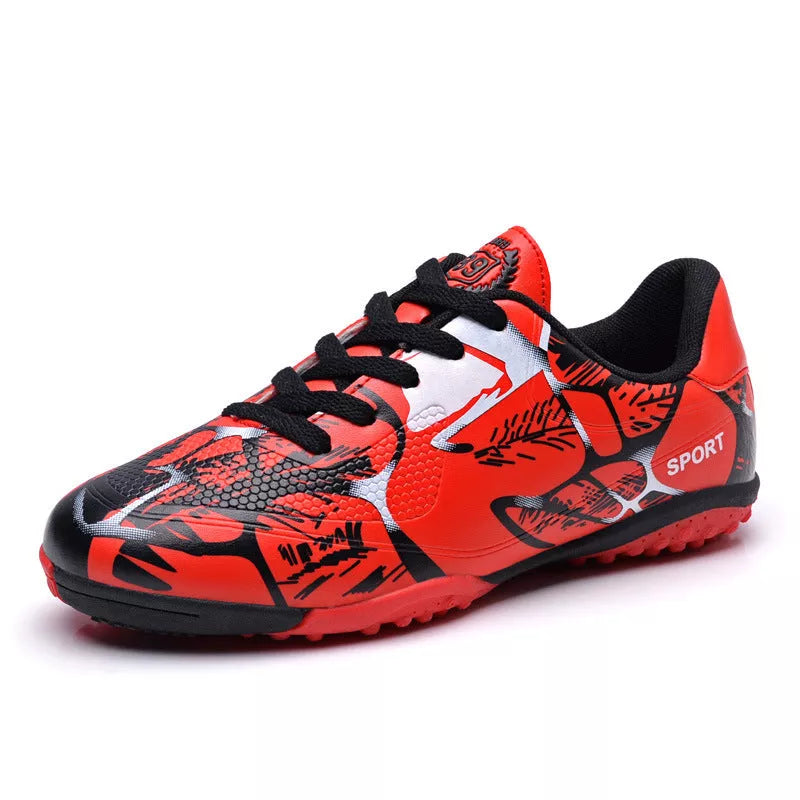 Low-top soccer shoes with rubber nails for boys and girls, available in red, blue, and fluorescent green.