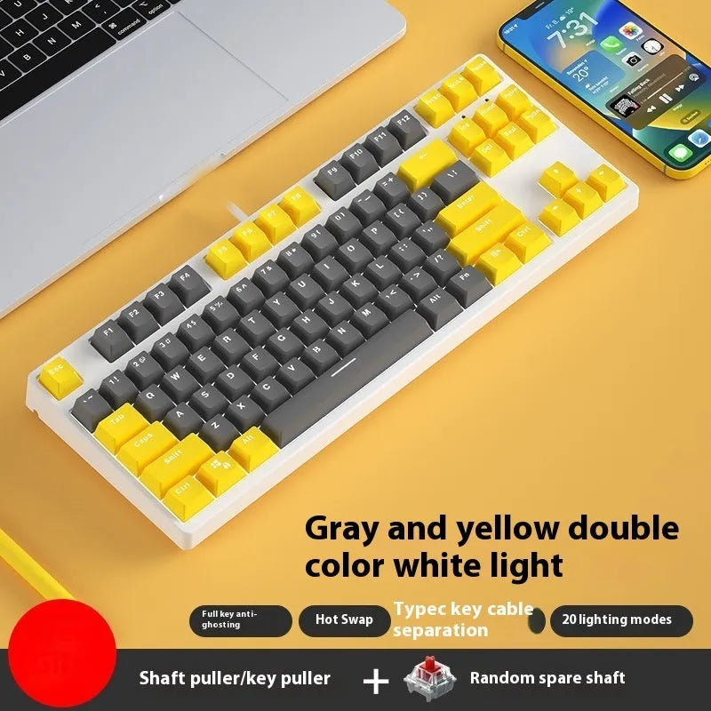 87-key mechanical keyboard with two-tone coloured keycaps on metal case
