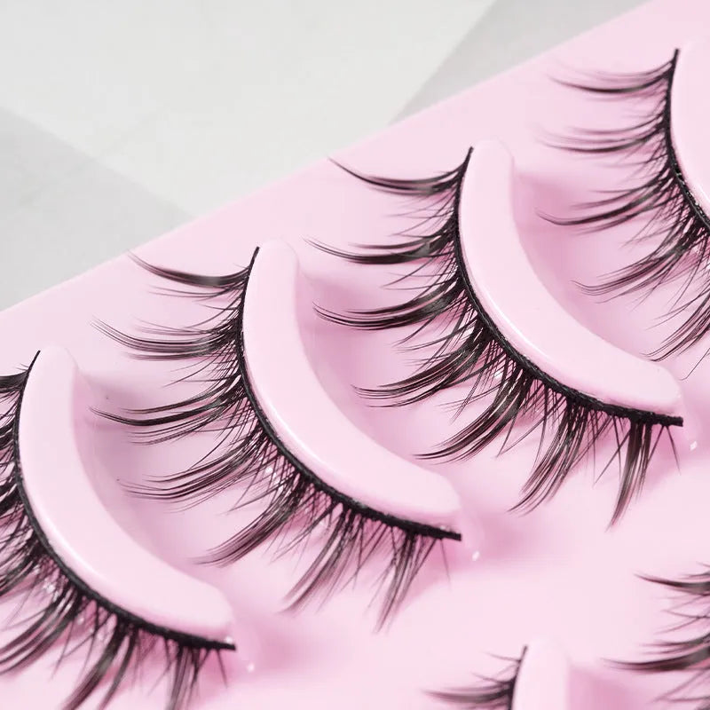 Set of manga-style false eyelashes in natural wispy styles 007, 008, and 009 on plastic black terrier