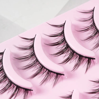 Set of manga-style false eyelashes in natural wispy styles 007, 008, and 009 on plastic black terrier