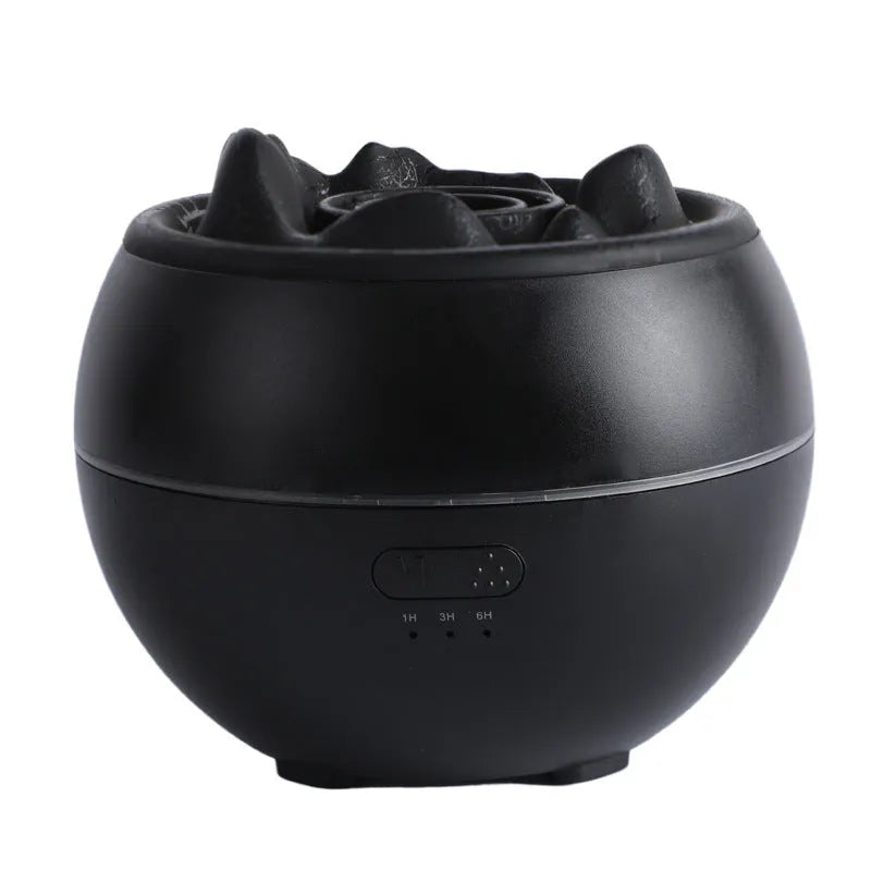 White flame aroma diffuser humidifier with round shape on wooden desk