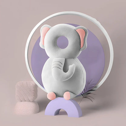 Toddler head protection pad with animal character design showing 33cm by 19cm dimensions