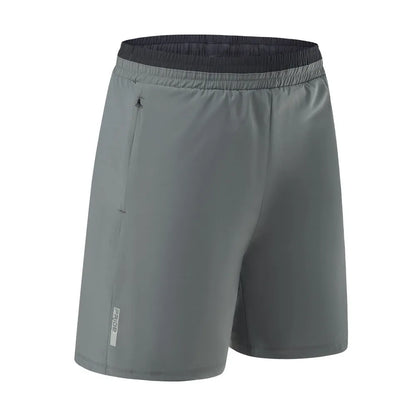 Men's loose grey ice silk cropped running pants showing the fifth pants length and relaxed fit.