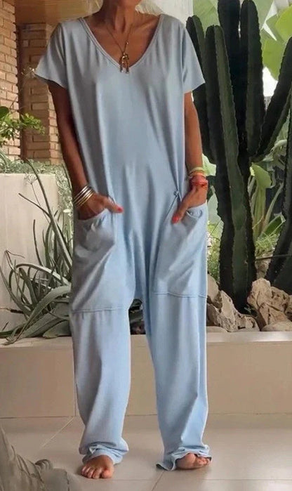 A stylish and comfortable oversized jumpsuit with roomy pockets, available in a variety of vibrant colors.