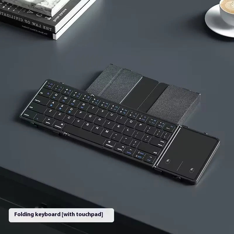 Black folding Bluetooth keyboard with choice of digital board or touchpad interface for tablets