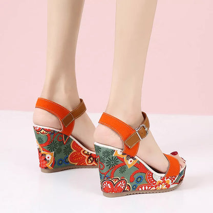 Women's floral embroidered high wedge sandals with buckle strap in black, green, and orange