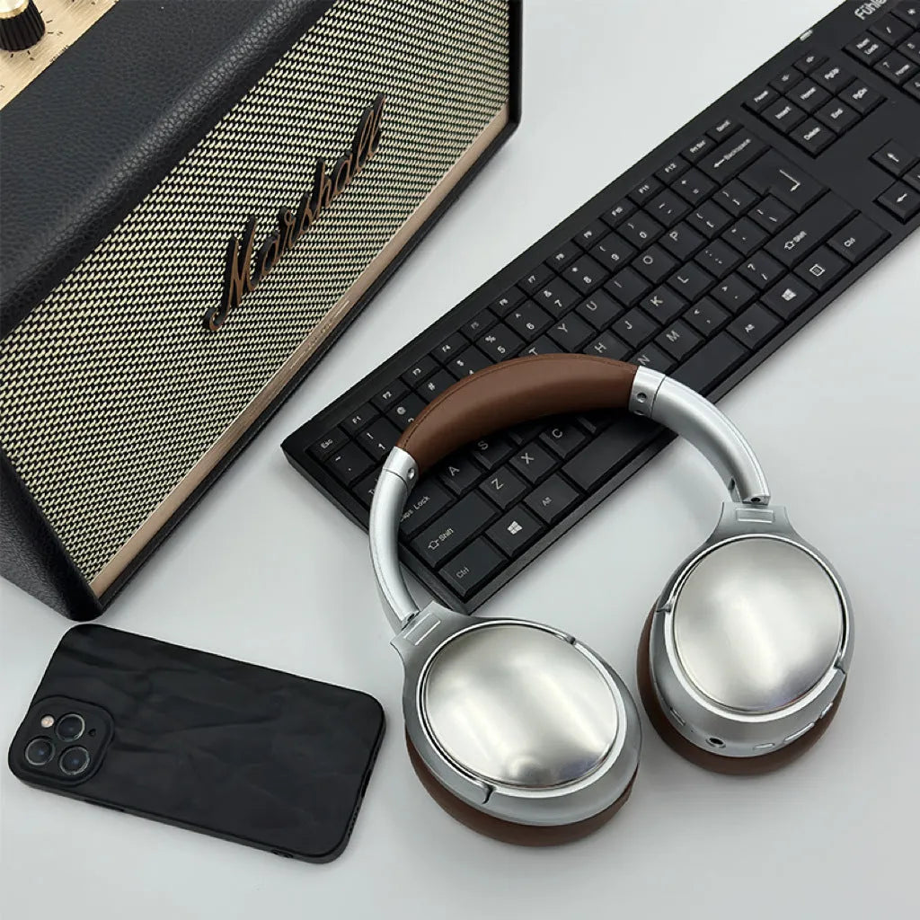 Retro style Bluetooth headphones with metal frame in brown, silver, or black colour
