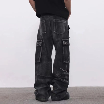 Men's black wide-leg cotton trousers with embroidery details on mid waist design