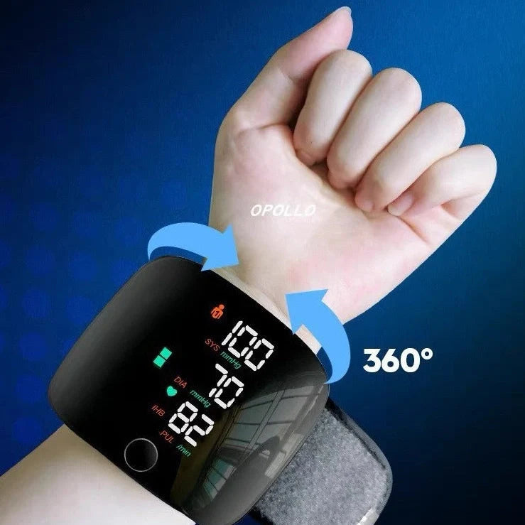 Black wrist blood pressure monitor with USB charging port and multilingual voice guidance options