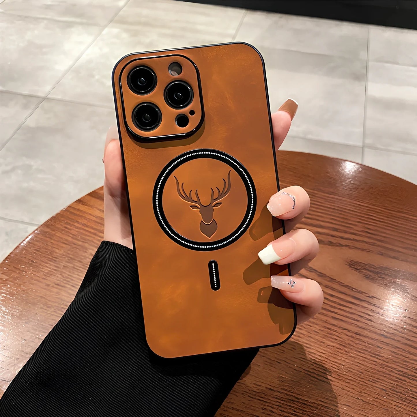Elk magnetic suction phone case with cartoon design showing magnetic closure and imitation leather texture