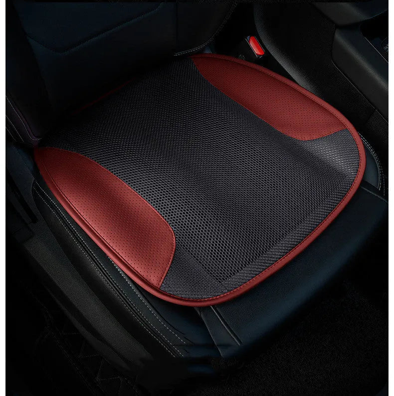 USB ventilated car seat cushion in black suede with leather trim, showing integrated cooling fans and power cable