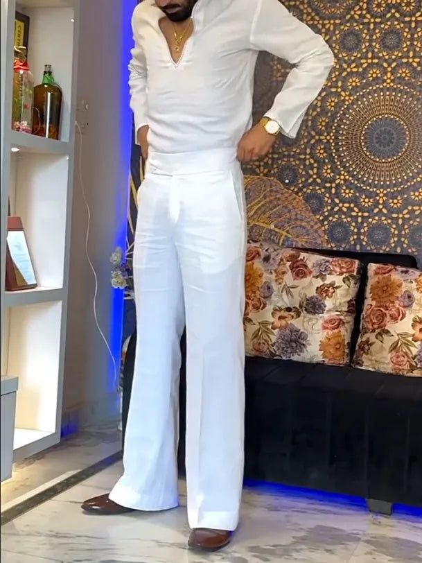 White three-piece polyester outfit showing V-neck shirt, sleeveless vest, and full-length trousers