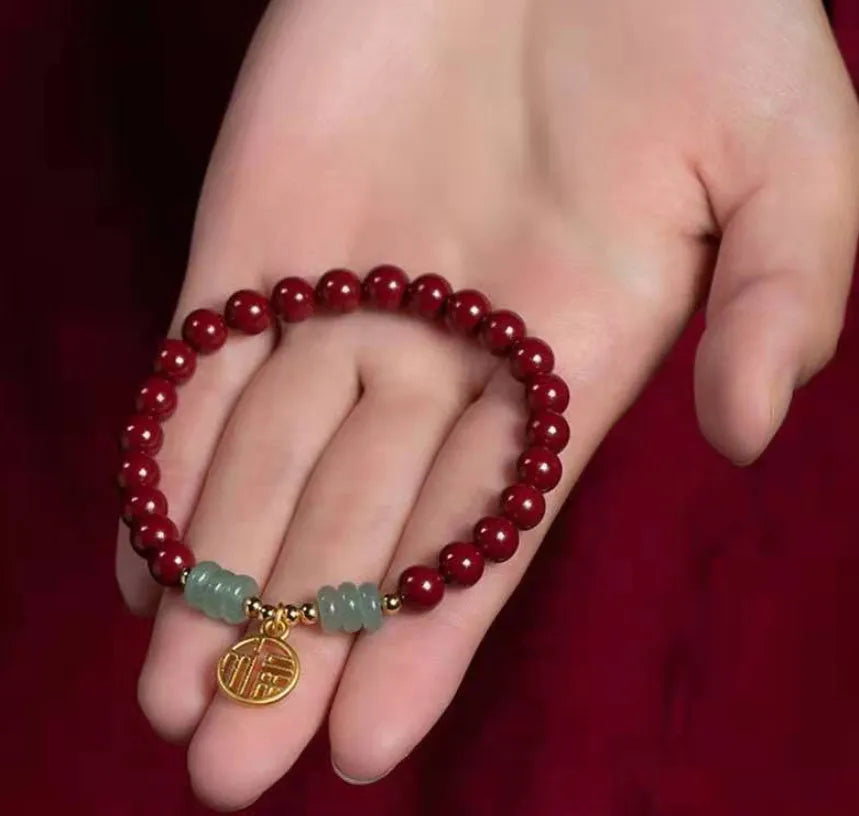 Handmade gold cinnabar wave bracelet with copper beads in national style.