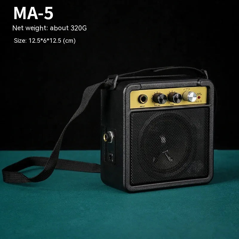 Small easy to carry guitar audio speaker, metal plastic, 25x8x26cm, model GA-10, portable musical instrument speaker