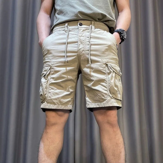 Loose straight multi-pocket casual overalls pants in black, grey, green, or khaki with a relaxed fit and five pockets.