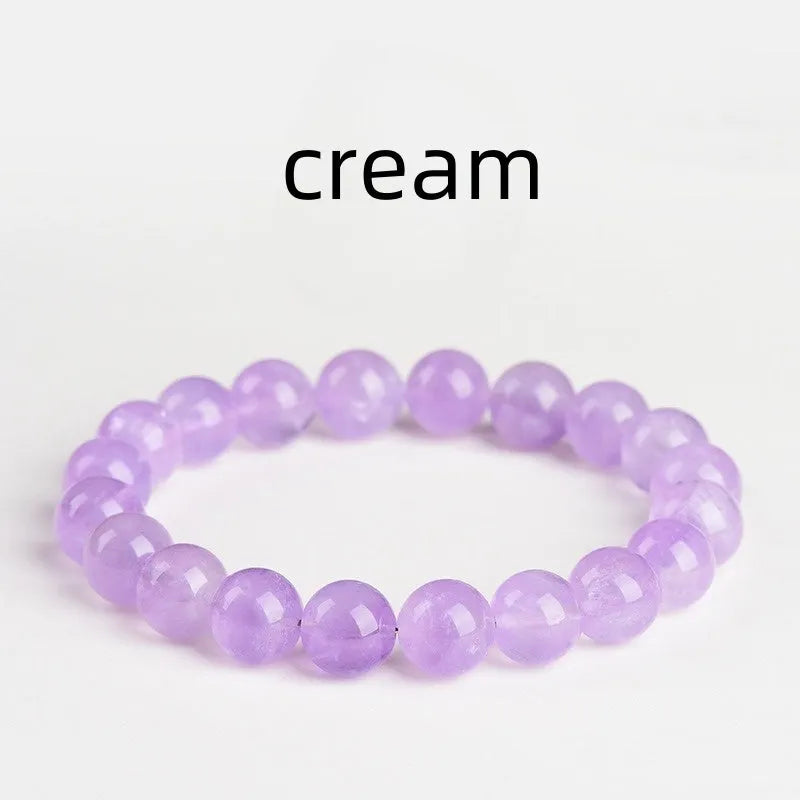 Lavender amethyst bracelet with water ripple geometric beads in various sizes on wrist