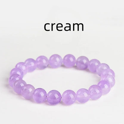 Lavender amethyst bracelet with water ripple geometric beads in various sizes on wrist