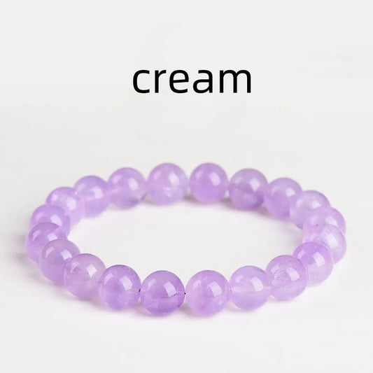 Lavender amethyst bracelet with water ripple geometric beads in various sizes on wrist