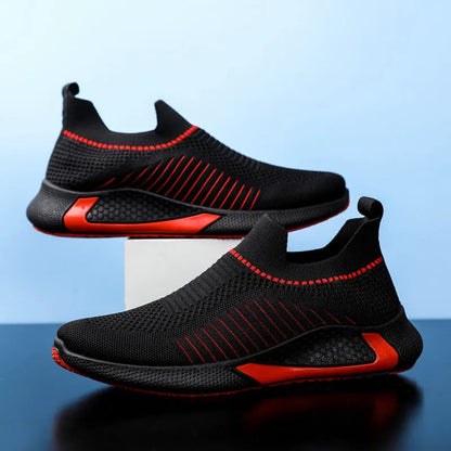 Men's black and white striped mesh slip-on sneakers with lace-up front.