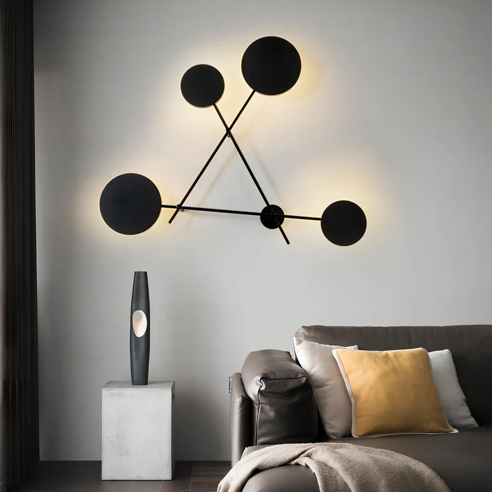 Triangular iron LED wall lamp with black finish and modern geometric design for home lighting