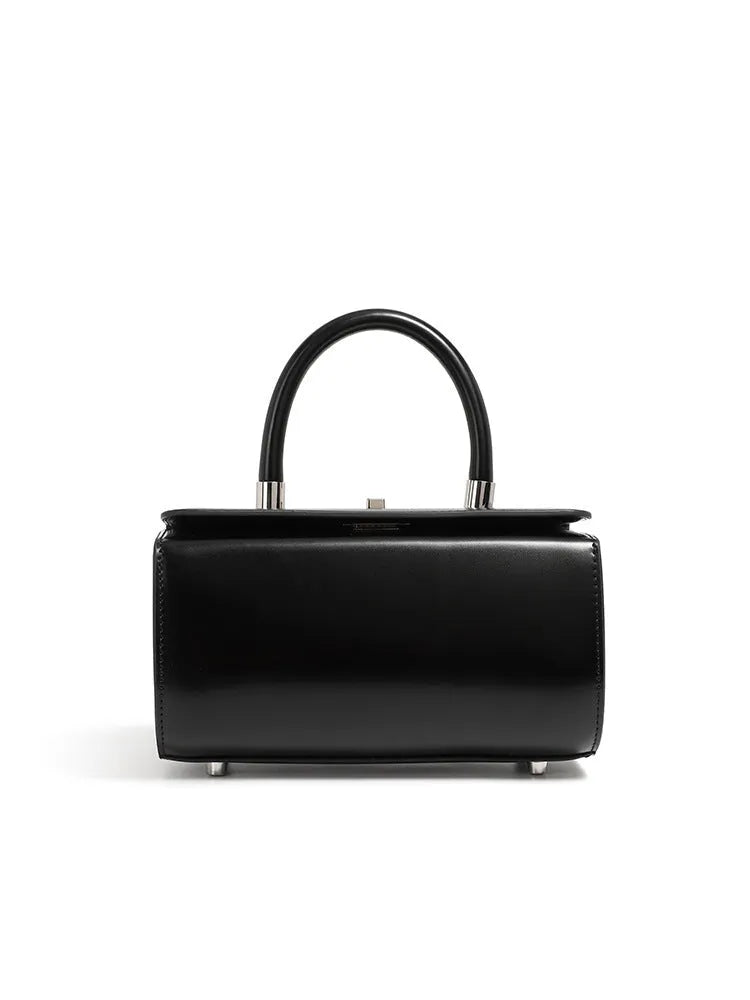 Genuine cowhide leather women's crossbody bag with clamshell opening and internal organisation compartments
