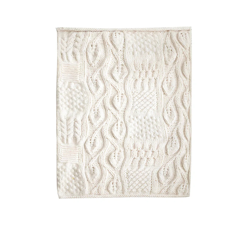 Beige hand-woven acrylic wool blanket 120x150cm 1.7kg on sofa, low 2-3% shrinkage