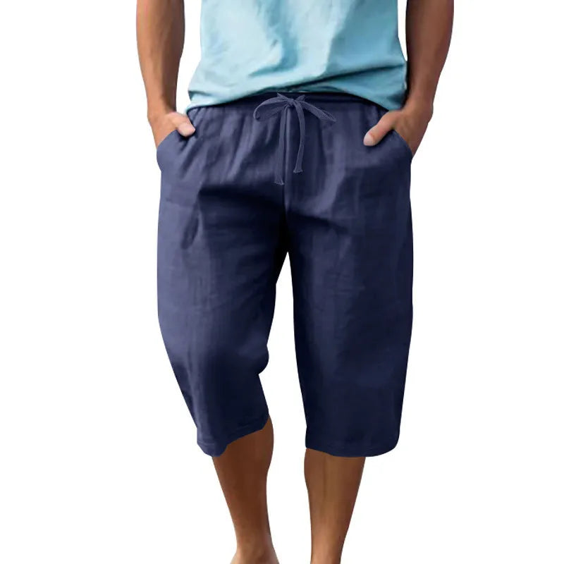 Men's linen shorts in light blue with drawstring waist and cropped straight-leg design