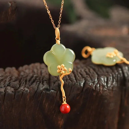 Flower inlaid pendant necklace on cross chain, retro geometric clavicle chain with electroplated finish.