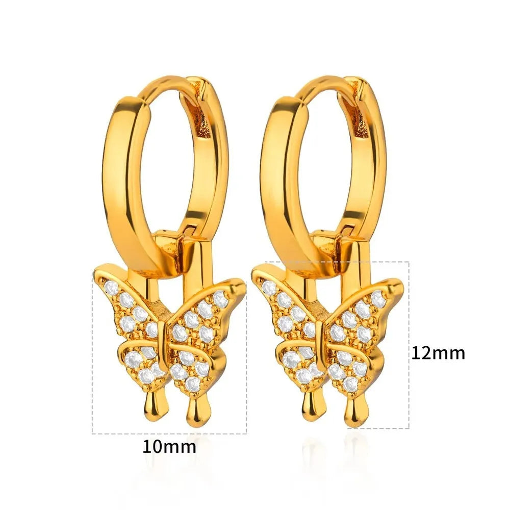 Women's irregular geometric butterfly earrings in copper with diamond treatment, showing heart-shaped and star designs in various colours
