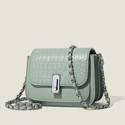 Women's soft PU shoulder bag with chain strap, horizontal square design in black colour showing sandwich pocket