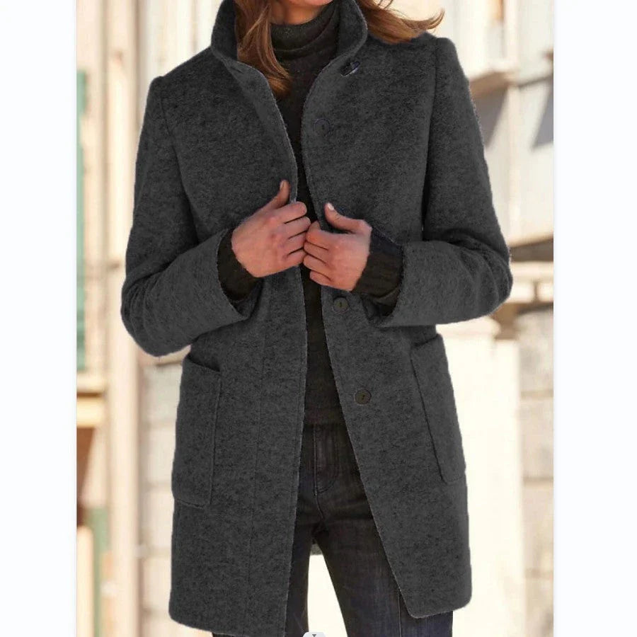 Fashionable woolen coat with stand collar, pockets, and button closure for women's fall and winter outerwear