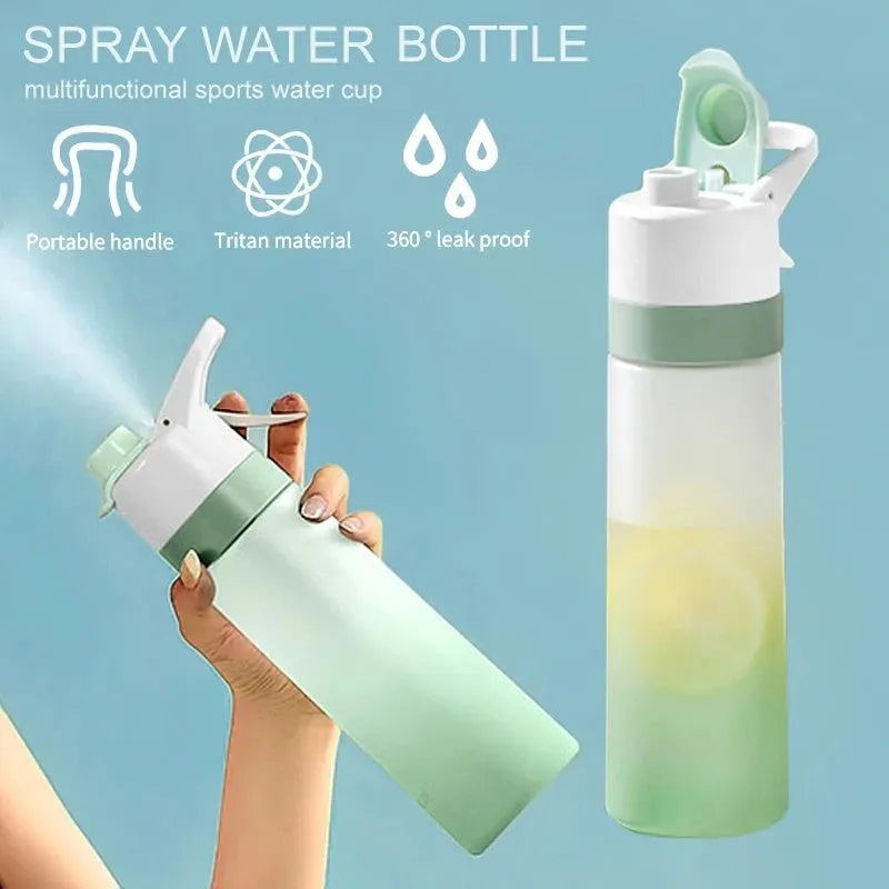 Large plastic spray water bottle with handle strap and leakproof lid in green colour.