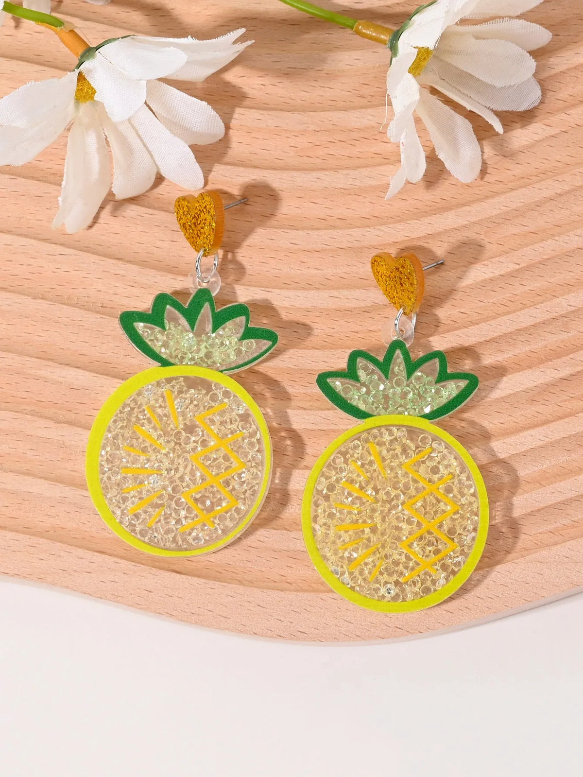 Colourful acrylic earrings with fruit and dessert designs including cherry, strawberry, watermelon, pineapple, coconut, cake and ice cream motifs