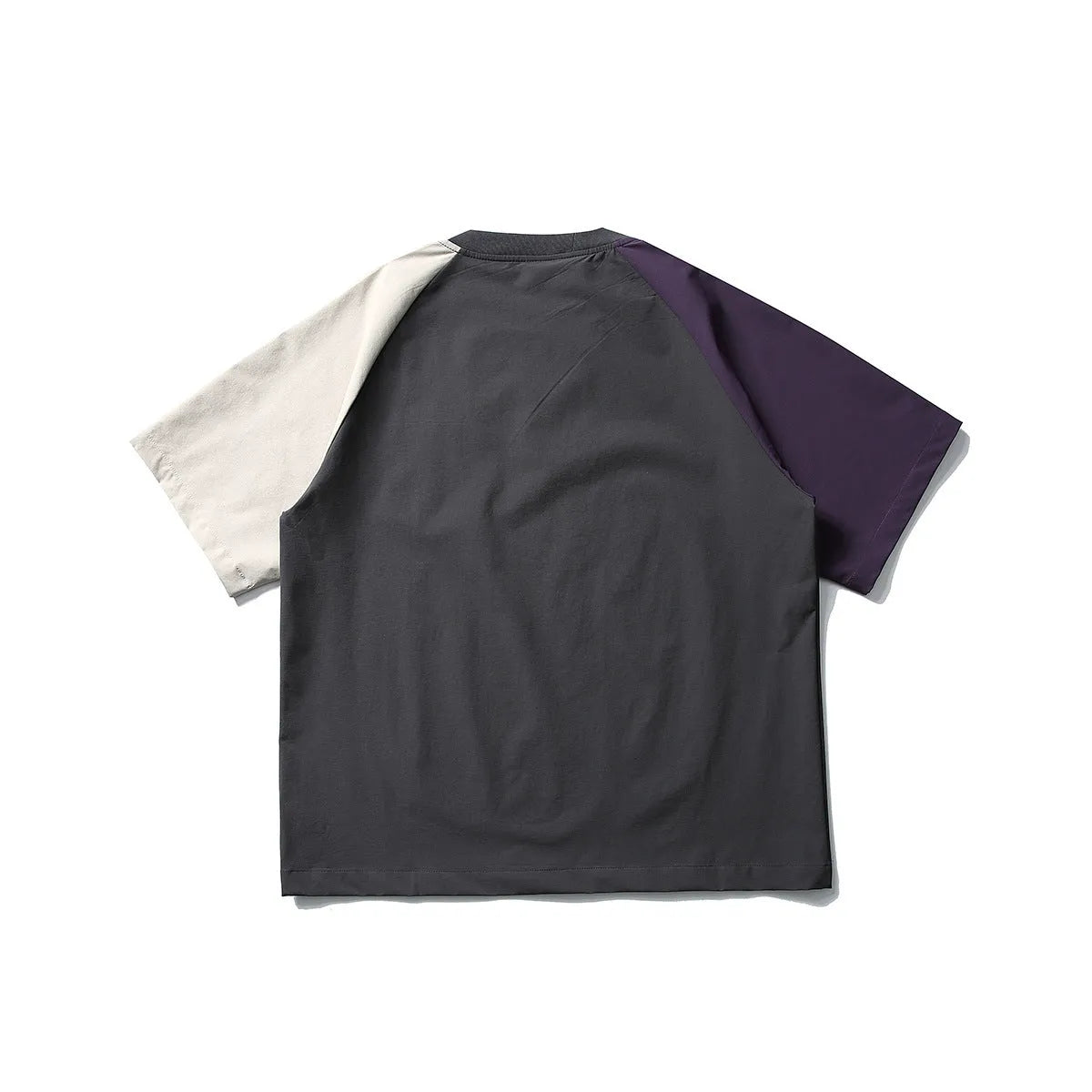 Dark grey loose fit men's t-shirt with contrast colour raglan sleeves on a hanger.
