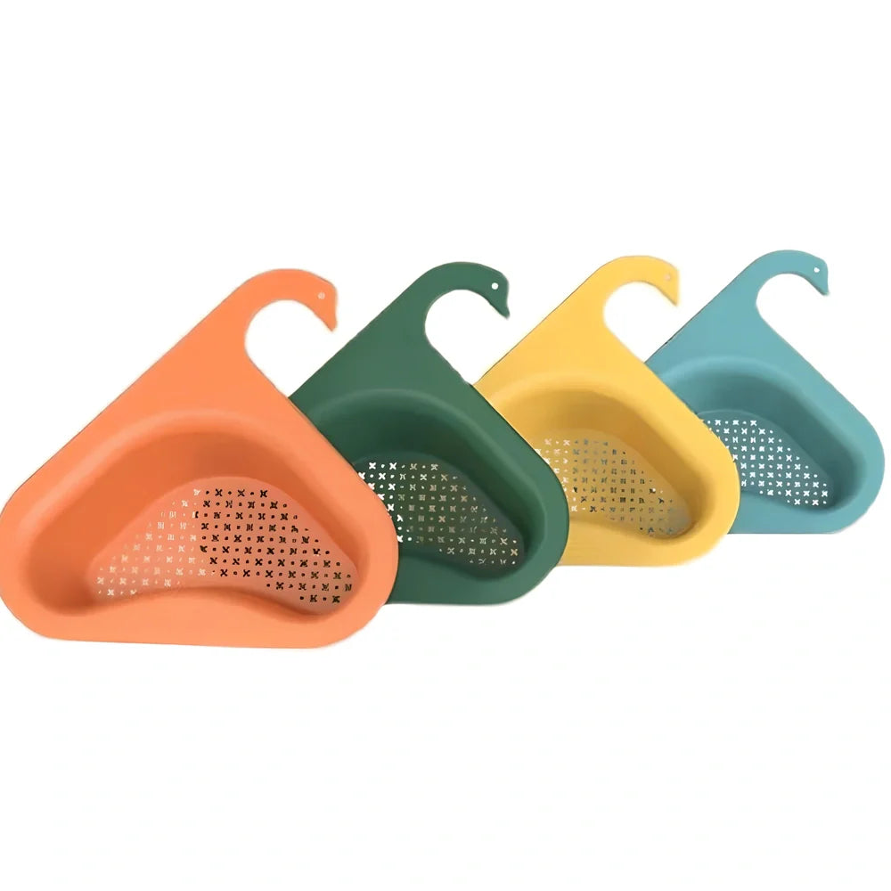Yellow swan-shaped plastic kitchen drainer basket with drainage holes on kitchen counter