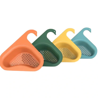 Yellow swan-shaped plastic kitchen drainer basket with drainage holes on kitchen counter