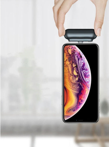 Black and white magnetic mini power bank showing compact dimensions and interchangeable charging heads