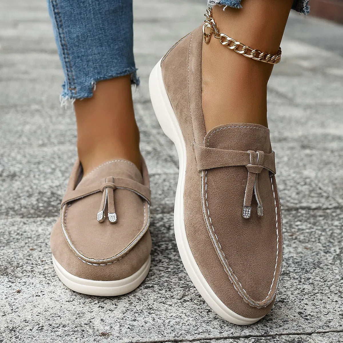Solid colour canvas platform loafers with a rubber sole and round toe in apricot, shown from a side angle.
