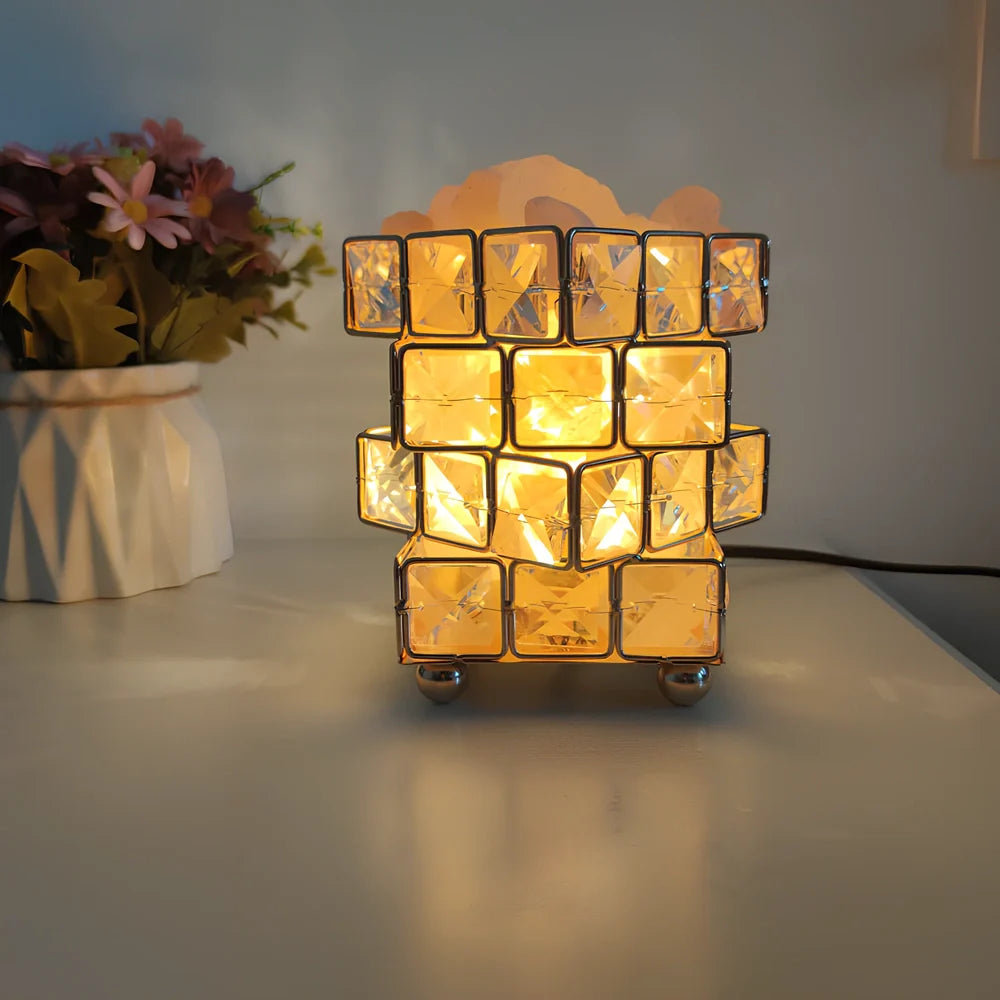 Himalayan salt lamp with wooden base and dimmable switch showing pink and orange salt rocks
