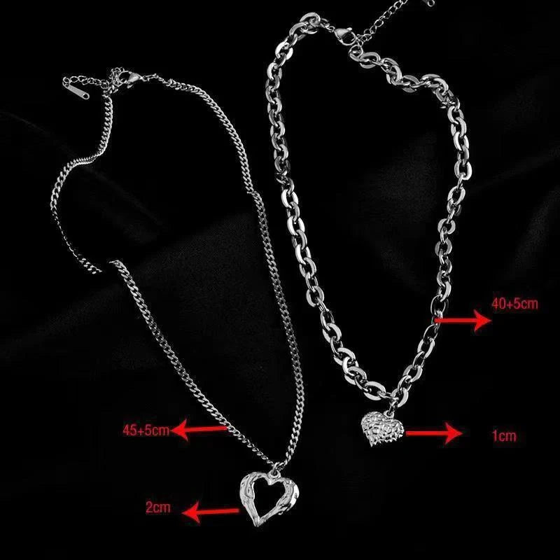 Stylish Titanium Steel Angel Wings Heart Necklace for Women in silver and golden finishes.
