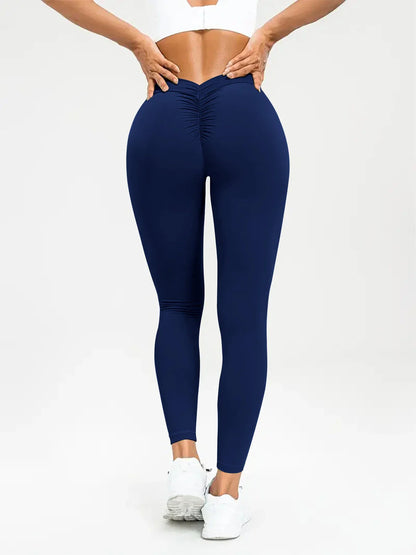 Slimming high-waist yoga pants with hidden tummy control, available in various colors and sizes